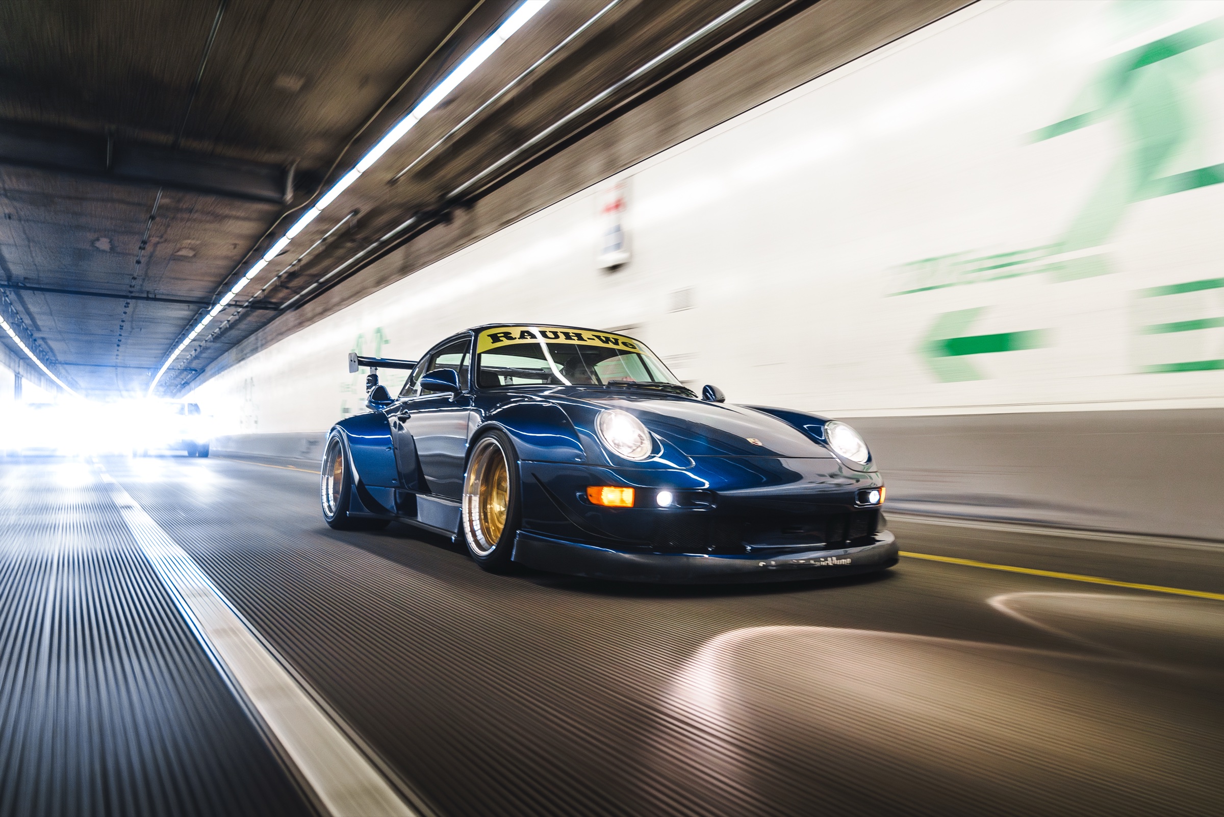 Rauh-Welt Porsche 993 rolling shot through a tunnel